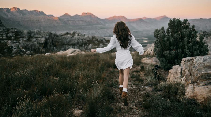 A serene landscape with a path, symbolizing the journey of mindful movement.